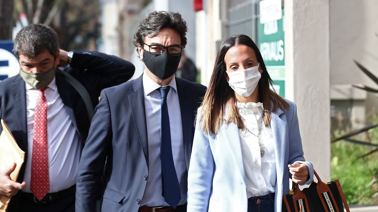 Agustina Cosachov, psychiatrist of late Argentine soccer legend Diego Armando Maradona arrives to a prosecutor's office in San Isidro, accompanied by her lawyer, Vadim Mischanchuk, in Buenos Aires. Credit: Reuters Photo