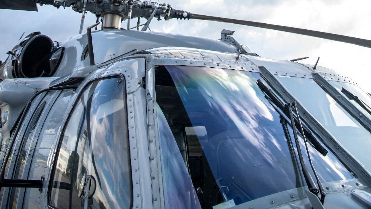 Handout picture released by the Colombian Presidency showing bullet holes in the presidential helicopter. Credit: AFP Photo