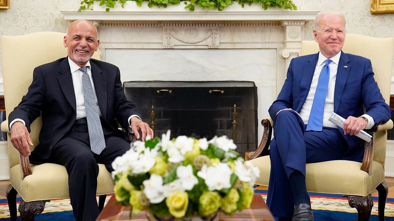 President Joe Biden (R) meets with Afghan President Ashraf Ghani in the Oval Office of the White House in Washington. Credit: AP/PTI Photo