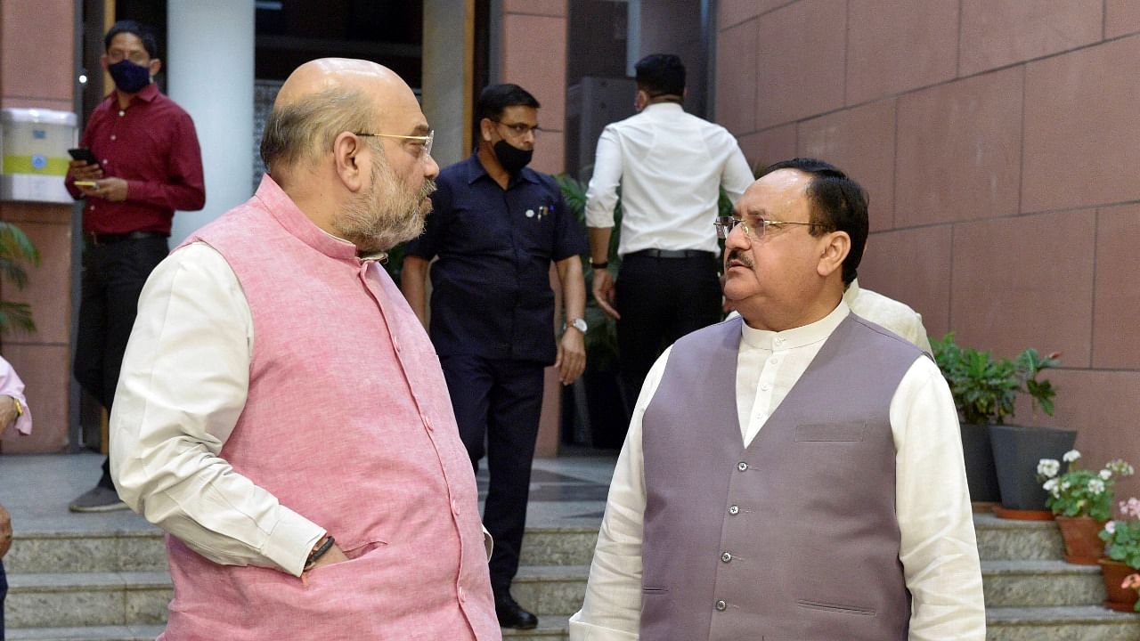 Union Home Minister Amit Shah and BJP National President J P Nadda. Credit: PTI File Photo