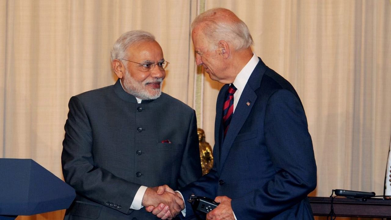 Prime Minister Narendra Modi greets US President Joe Biden. Credit: PTI File Photo