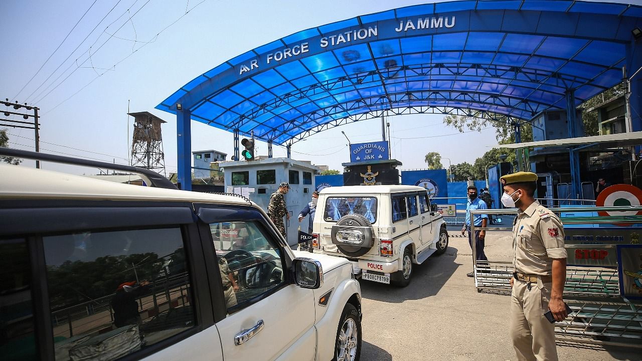 A team of National Investigation Agency (NIA) arrives at Jammu Air Force Station after two low intensity explosions reported in the technical area of Jammu Air Force Station in the early hours of Sunday. Credit: PTI Photo