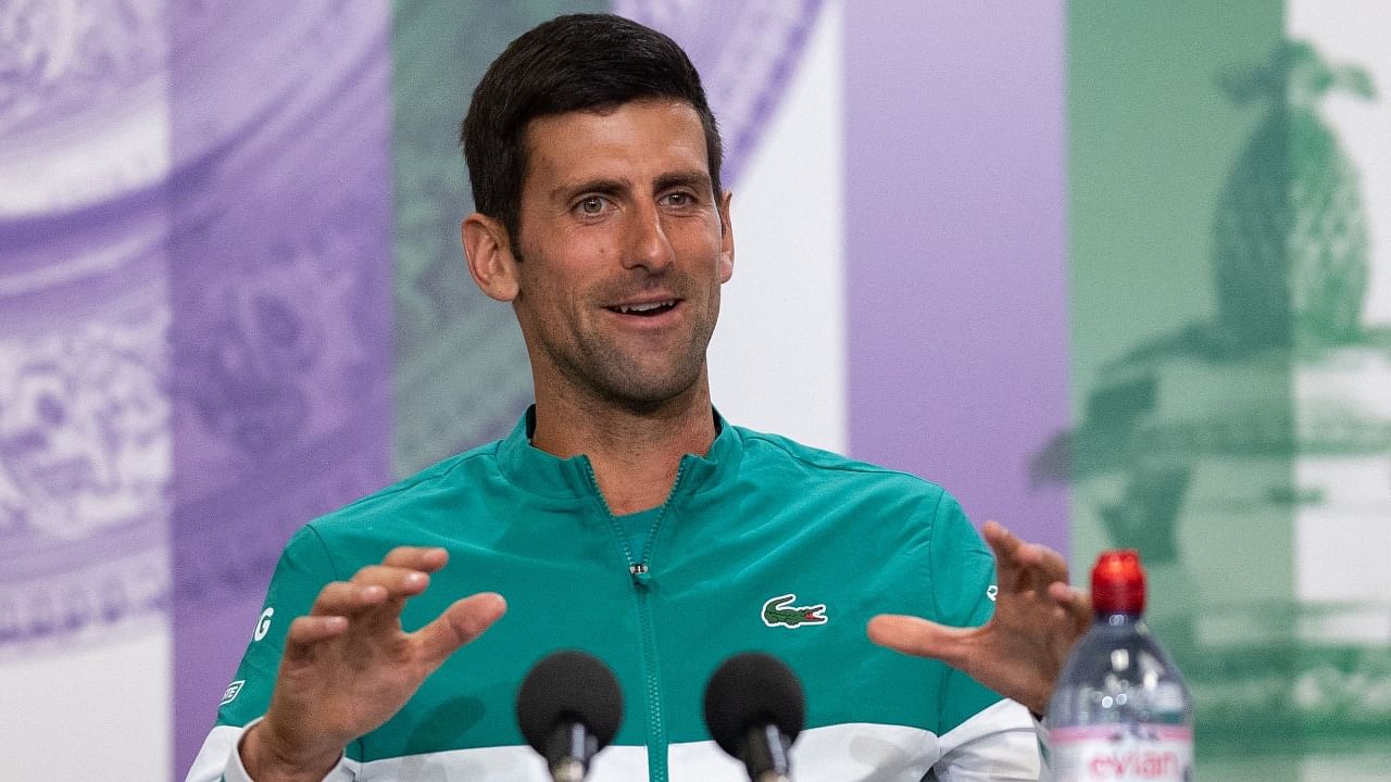 Serbia's Novak Djokovic attends a press conference at The All England Tennis Club in Wimbledon, southwest London, on June 26, 2021, ahead of the start of the 2021 Wimbledon Championships tennis tournament. Credit: AFP Photo