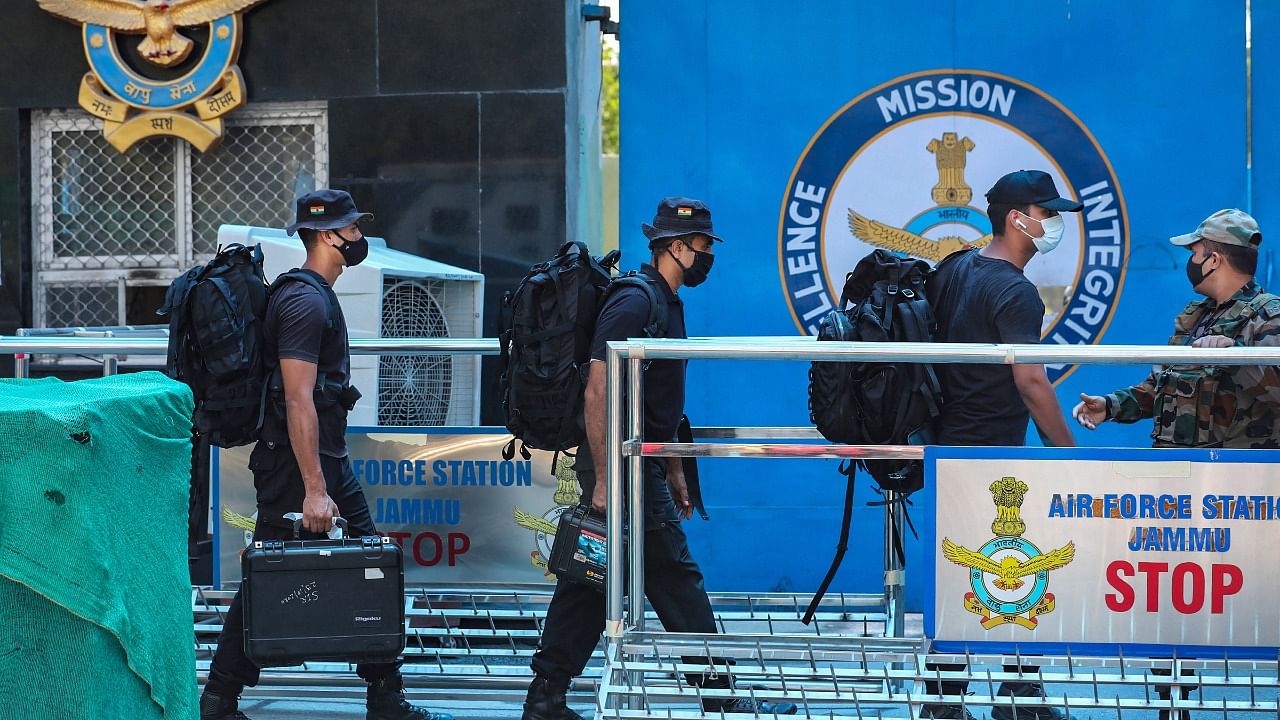 Special security force arrives at Air Force Station after two low intensity explosions reported in the technical area of Jammu Air Force Station in the early hours of Sunday. Credit: PTI Photo
