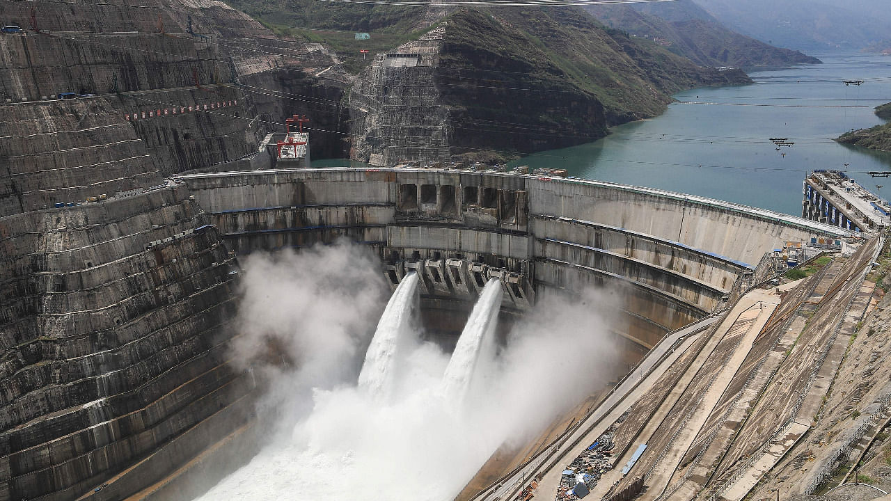 This aerial photo taken on June 26, 2021 shows the 289-metre (948 ft.) tall Baihetan Hydropower Station in Zhaotong, in China's southwestern Yunnan province. Credit: AFP Photo