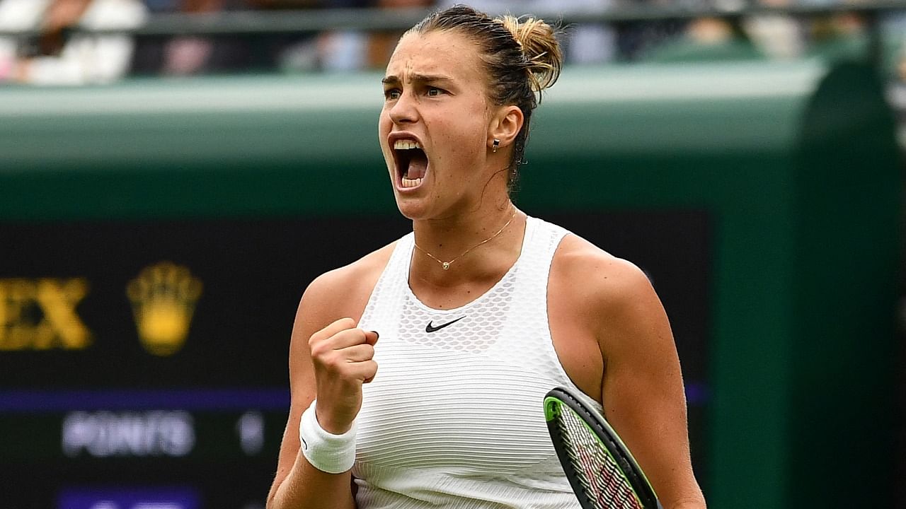 Belarus' Aryna Sabalenka celebrates her match win against Romania's Monica Niculescu during their women's singles first round match of the 2021 Wimbledon Championships. Credit: AFP Photo