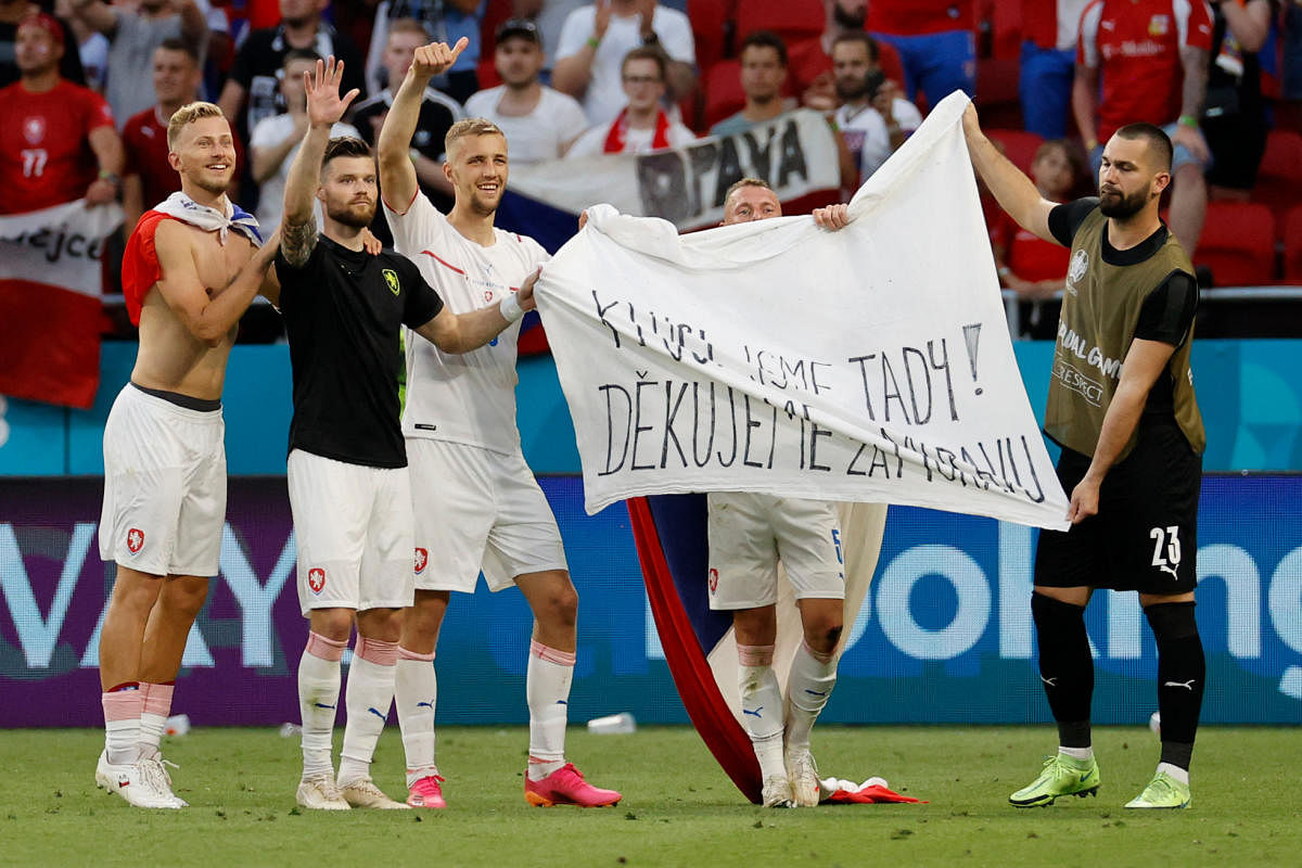 Czech Republic's players celebrate at the end of the UEFA EURO 2020 round of 16 football match between the Netherlands and the Czech Republic at Puskas Arena in Budapest. Credit: AFP Photo