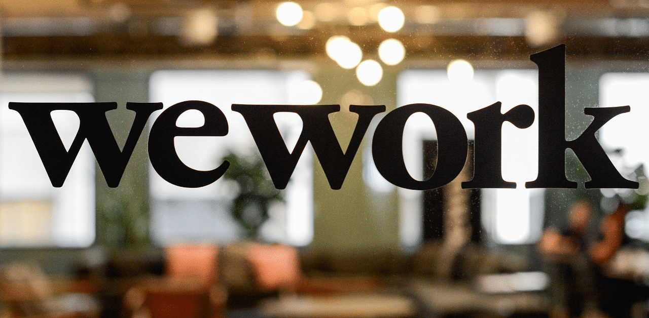A WeWork logo is seen at a WeWork office. Credit: Reuters Photo