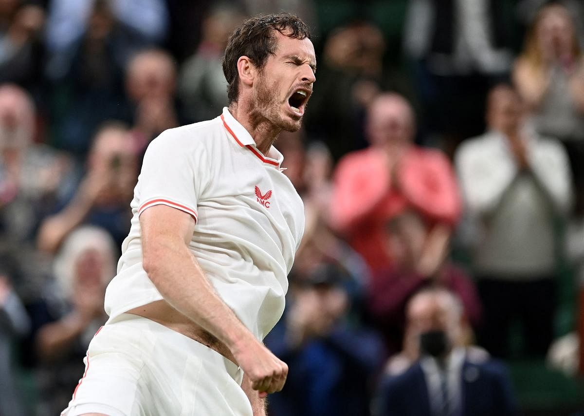 Britain's Andy Murray celebrates winning against Georgia's Nikoloz Basilashvili during their men's singles first round match on the first day of the 2021 Wimbledon Championships at The All England Tennis Club in Wimbledon, southwest London. Credit: AFP Photo