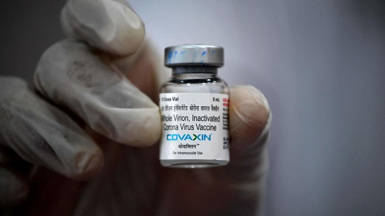 A medical worker displays a vial of the Covaxin vaccine against the Covid-19 coronavirus at a vaccination centre in Mumbai. Credit: AFP Photo