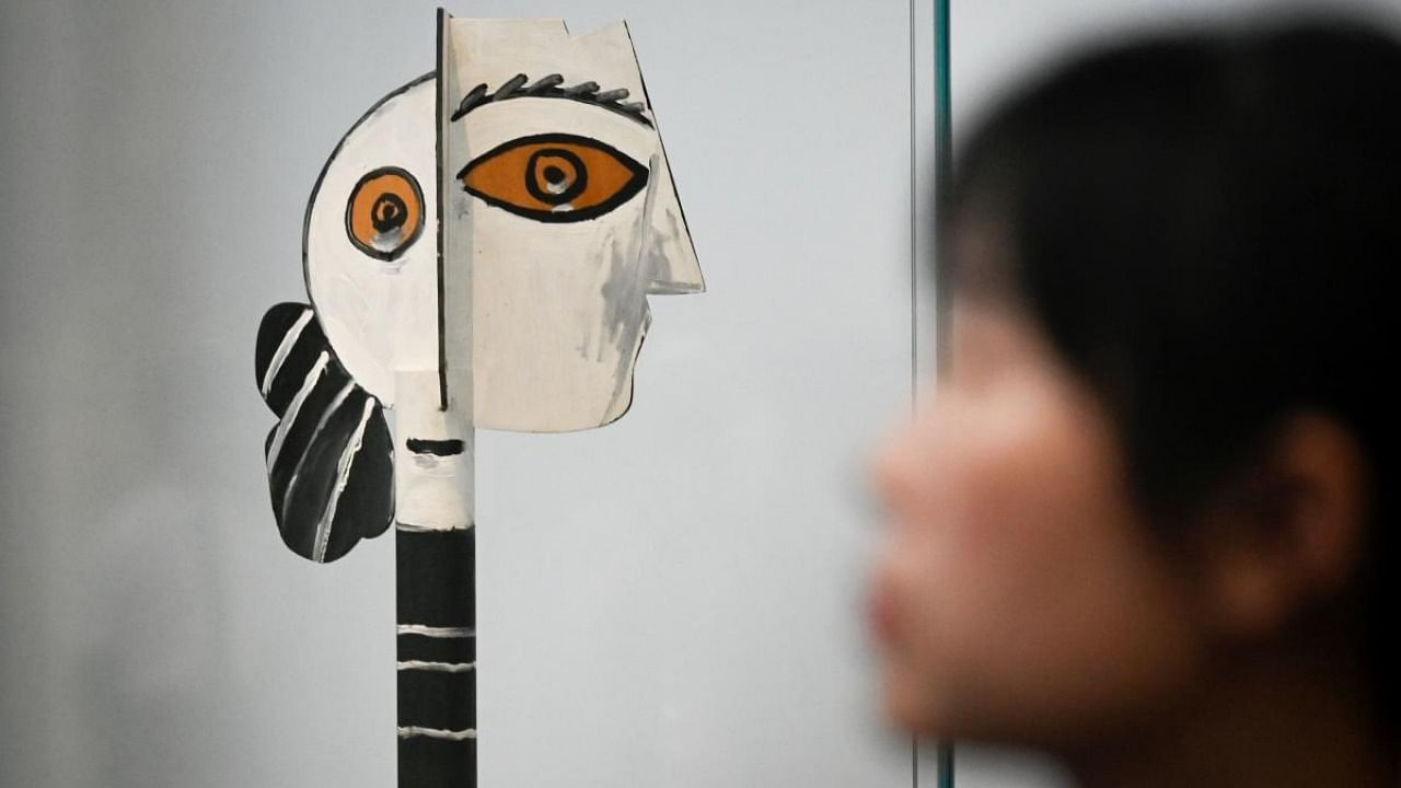 This picture taken on June 14, 2019 shows a painted and cut wood entitled "Head of Woman" by Pablo Picasso during an exhibition "Picasso Birth of a Genius" at an art gallery in Beijing. Credit: AFP Photo
