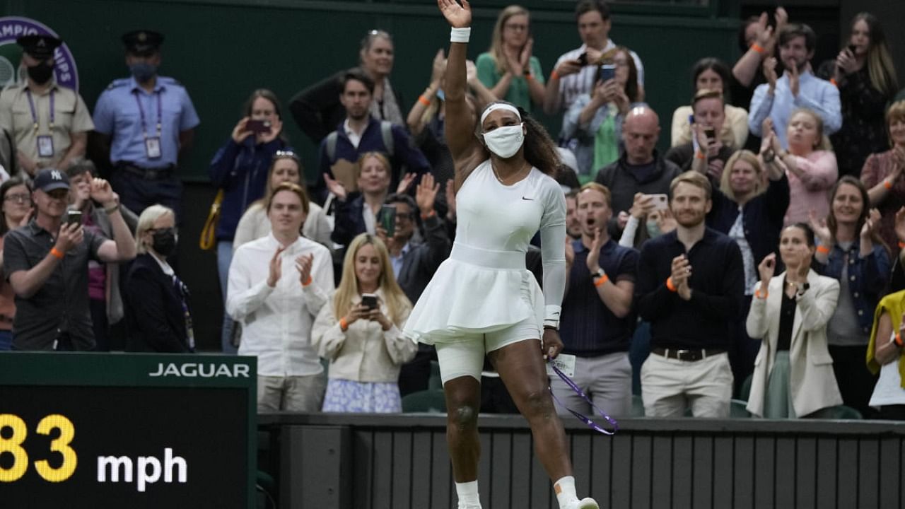  Serena Williams of the US waves as she leaves the court after retiring from the women's singles first round match against Aliaksandra Sasnovich of Belarus. Credit: AP Photo