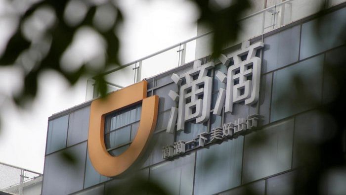 Logo of Didi Chuxing is seen at its headquarters building in Beijing. Credit: Reuters Photo
