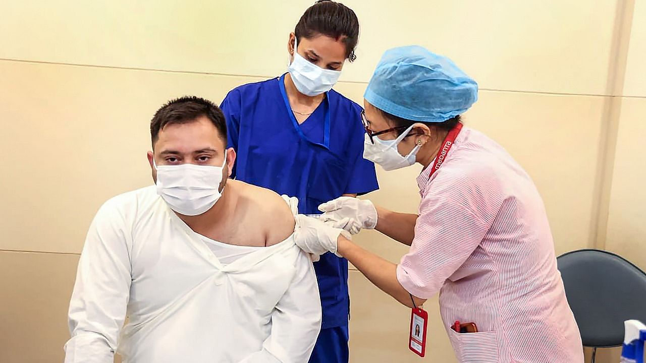 Tejashwi Yadav receives his Covid-19 vaccine. Credit: PTI Photo