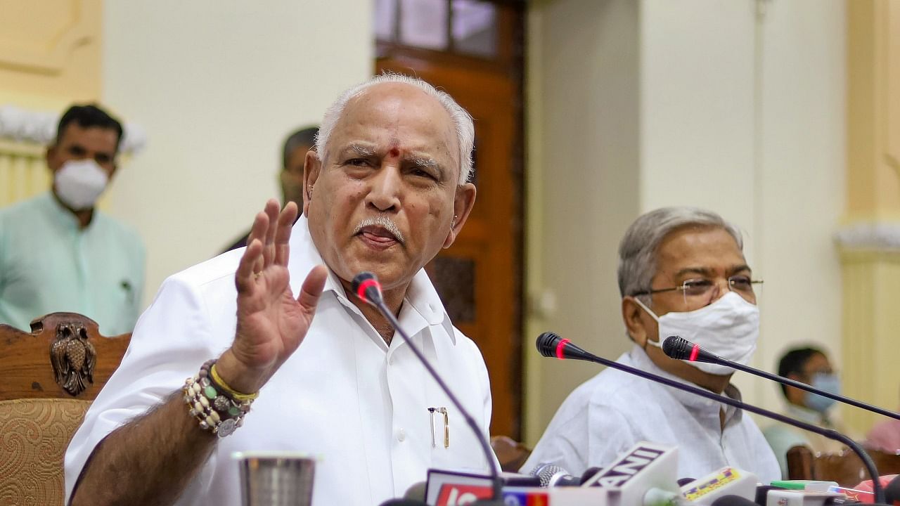 Chief Minister B S Yediyurappa (L). Credit: PTI Photo