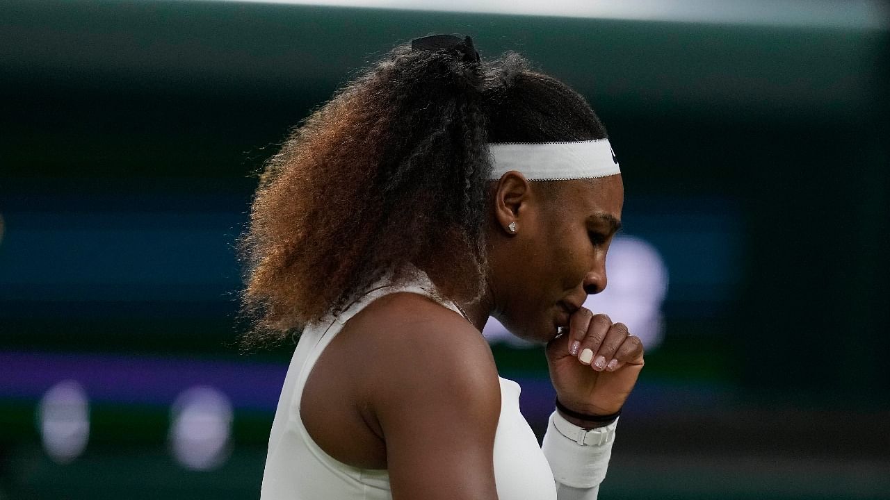 Serena Williams of the US after falling to the ground during the women's singles first round match against Aliaksandra Sasnovich of Belarus on day two of the Wimbledon Tennis Championships in London. Credit: Reuters photo