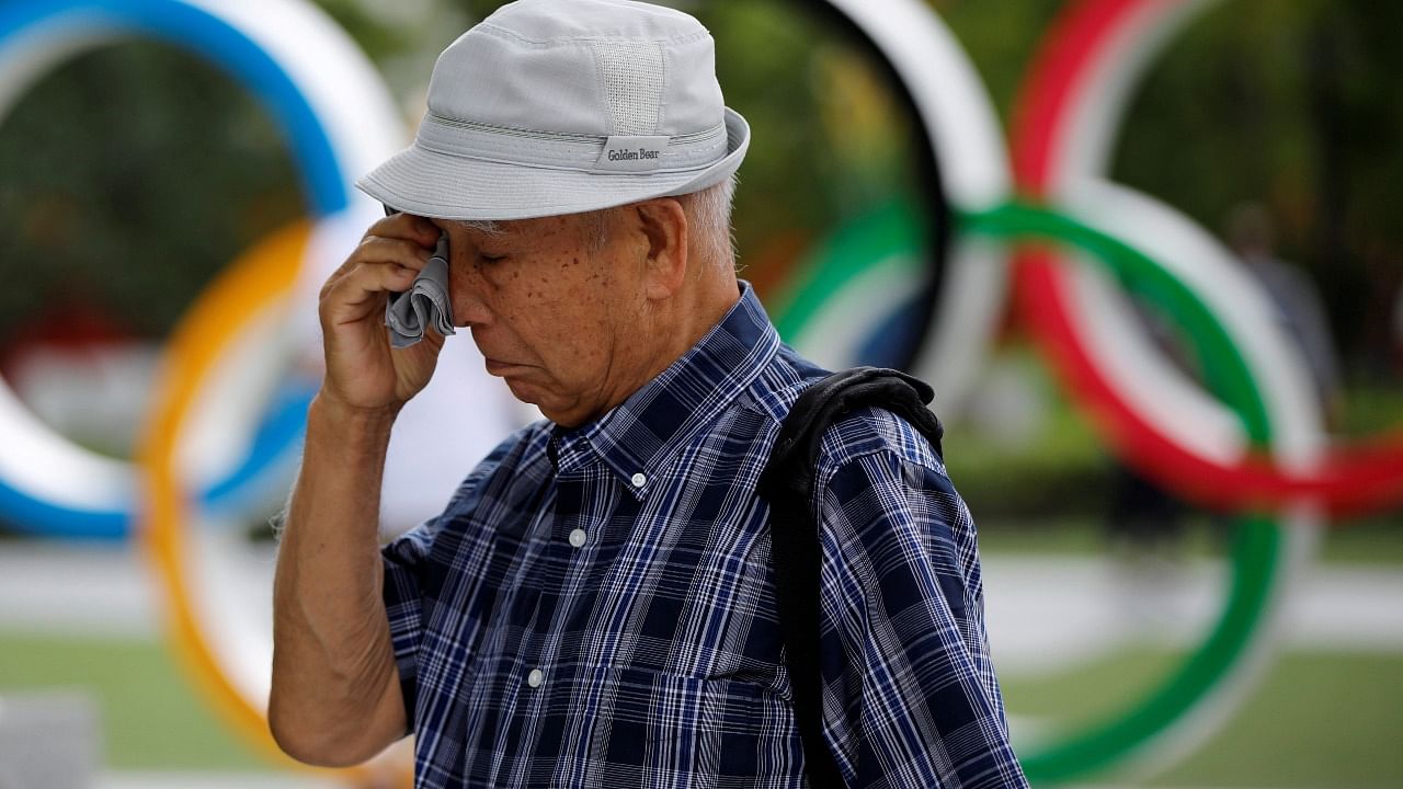 Kohei Jinno, 87, was forced to leave his house two times ahead of the 1964 and 2020 Olympics Games to make way for construction of the main stadium. Credit: Reuters Photo