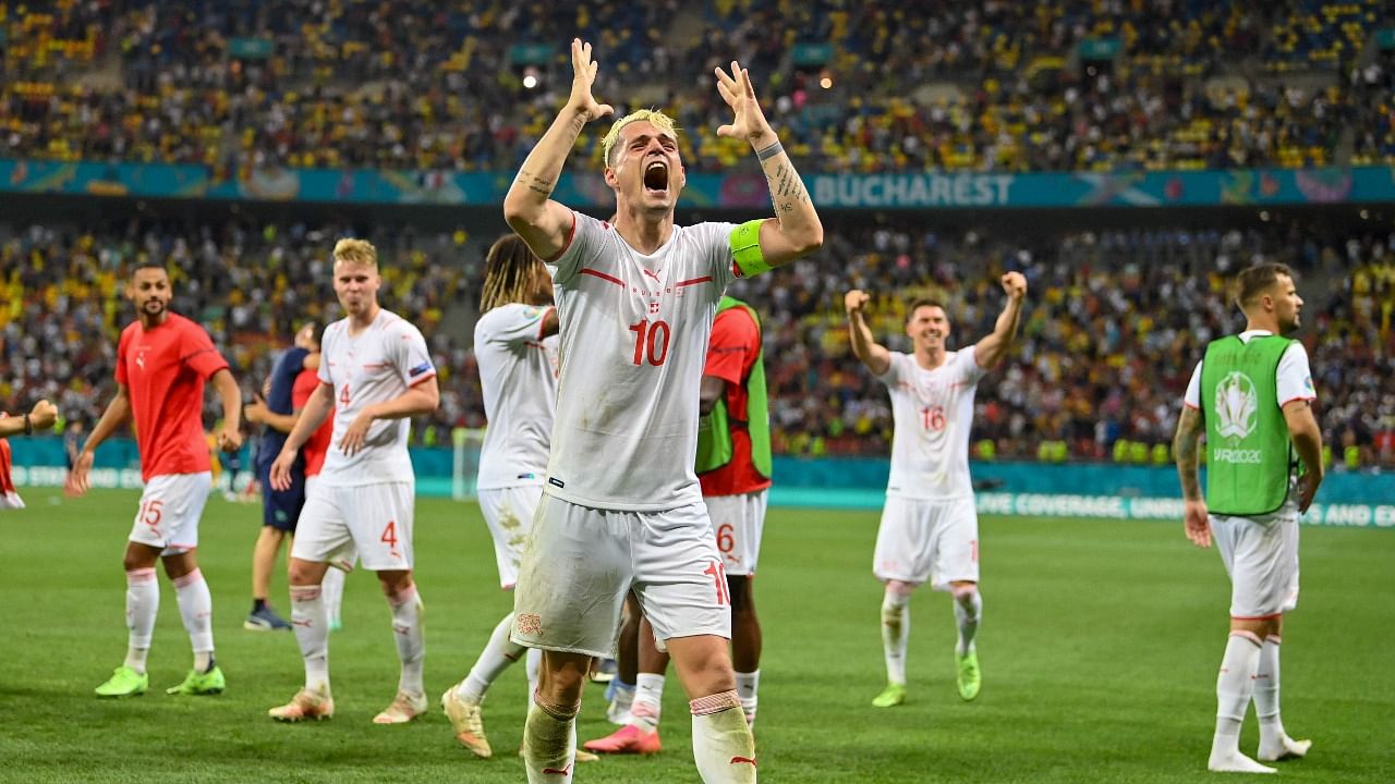 Xhaka celebrates after winning against France. Credit: AFP Photo