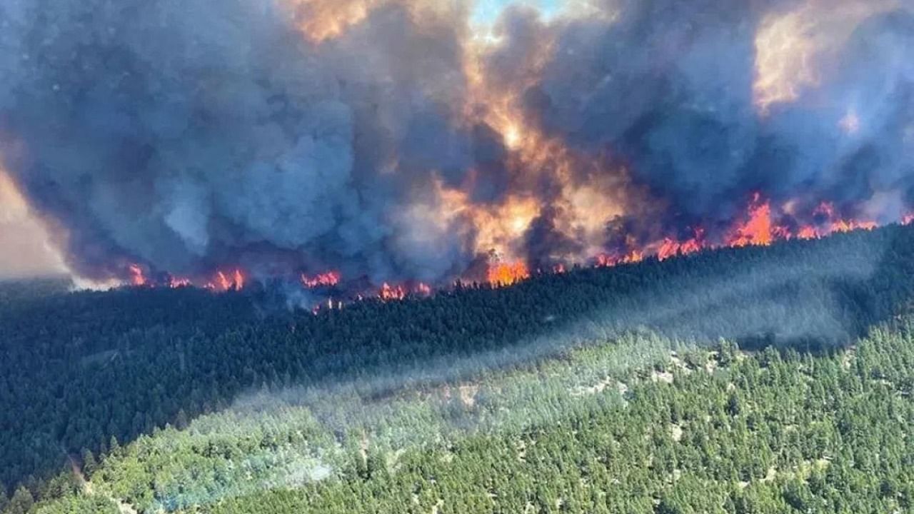 Multiple fires have broken out in British Columbia and evacuation orders have been issued for the village of Lytton, which has set a new temperature record by reaching 121 degrees Fahrenheit (49.5 degrees Celsius) in recent days. Credit: AFP Photo