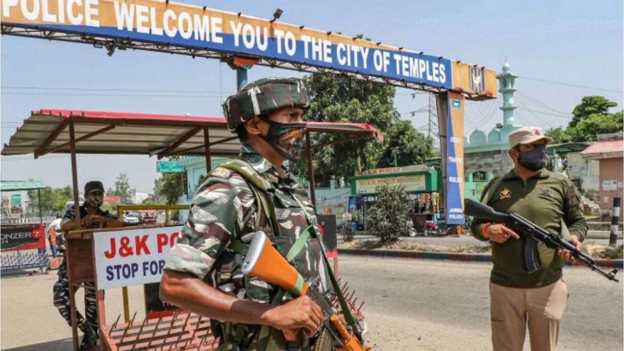 Security personnel on high alert at Jammu-Pathankot National Highway after troops spotted drones separately flying over Kunjwani and Kaluchak recently, in Jammu, Wednesday, June 30, 2021. Credit: PTI Photo