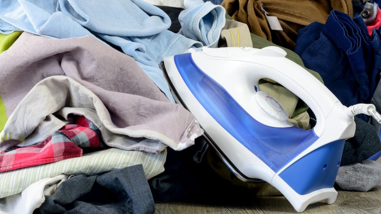 Now people are washing and ironing clothes at home as they are less in quantity. Credit: iStock Photo