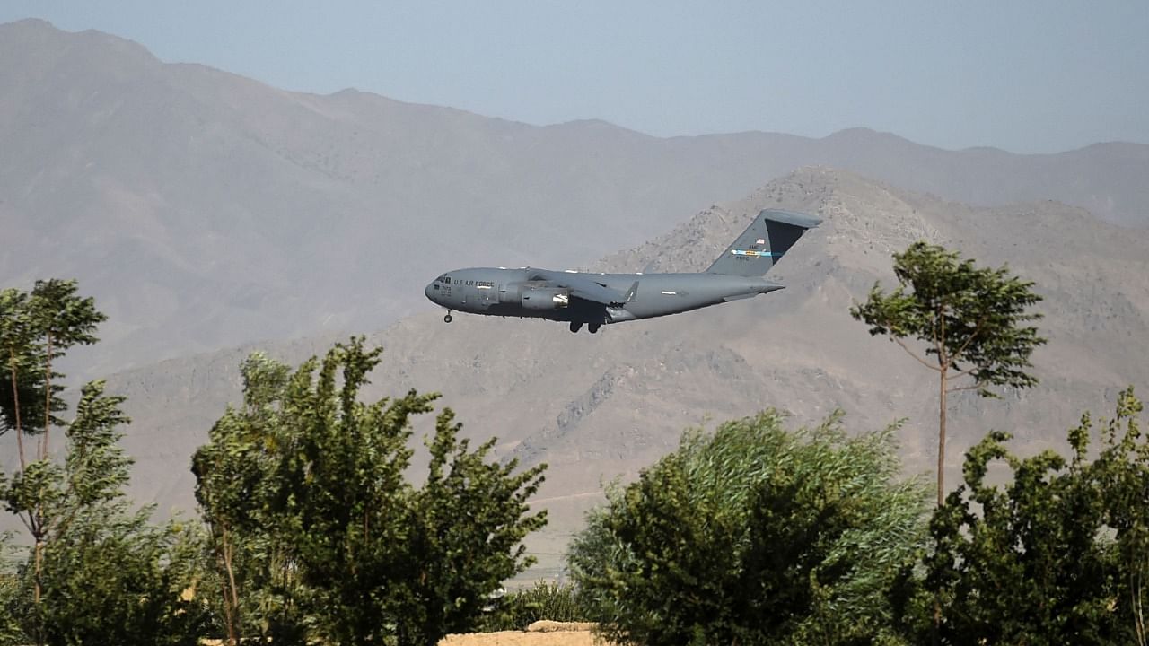 A US Air Force transport plane lands at the Bagram Air Base in Bagram. Credit: AFP Photo