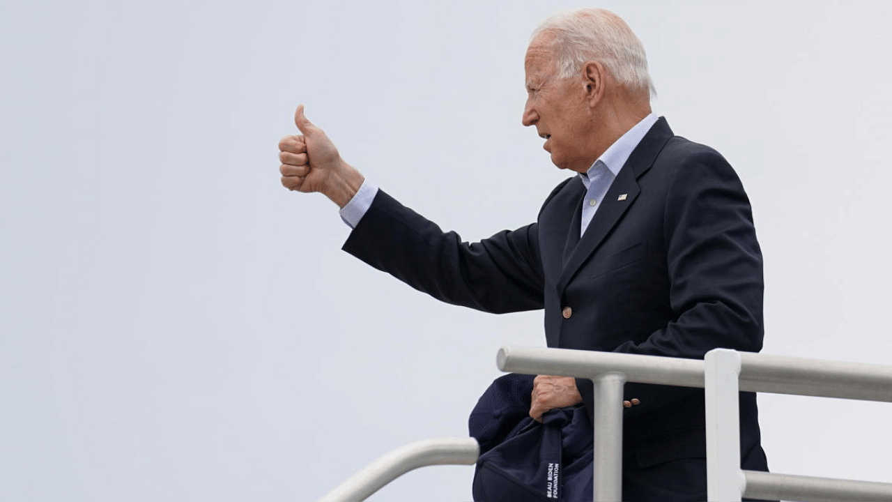 US President Joe Biden gives a thumbs-up before departing from Miami International Airport on Air Force One, in Miami, Florida. Credit: Reuters Photo