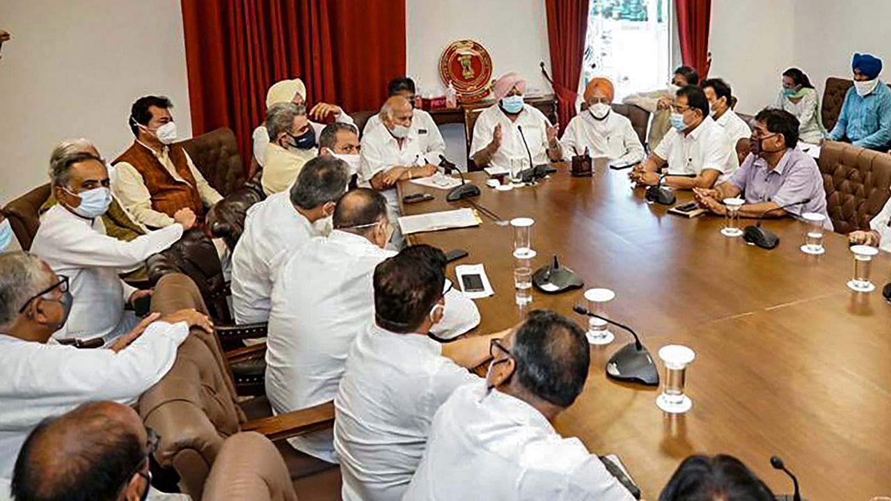 Punjab Chief Minister Capt. Amarinder Singh (C) during a discussion with senior Congress leaders. Credit: Twitter Photo/@capt_amarinder/via PTI