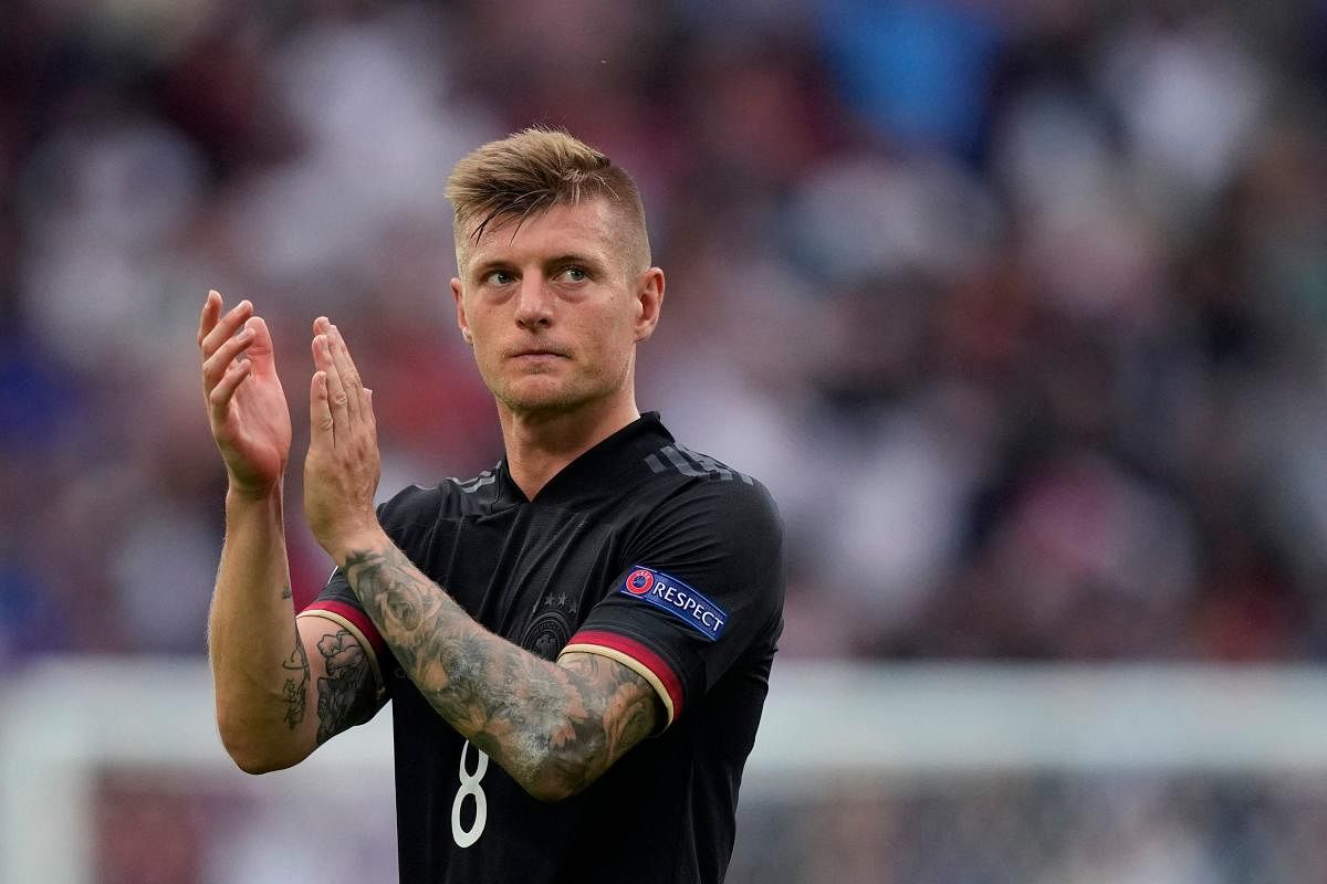 Germany's midfielder Toni Kroos applauds at the end of the UEFA EURO 2020 round of 16 football match between England and Germany at Wembley Stadium in London. Credit: AFP Photo