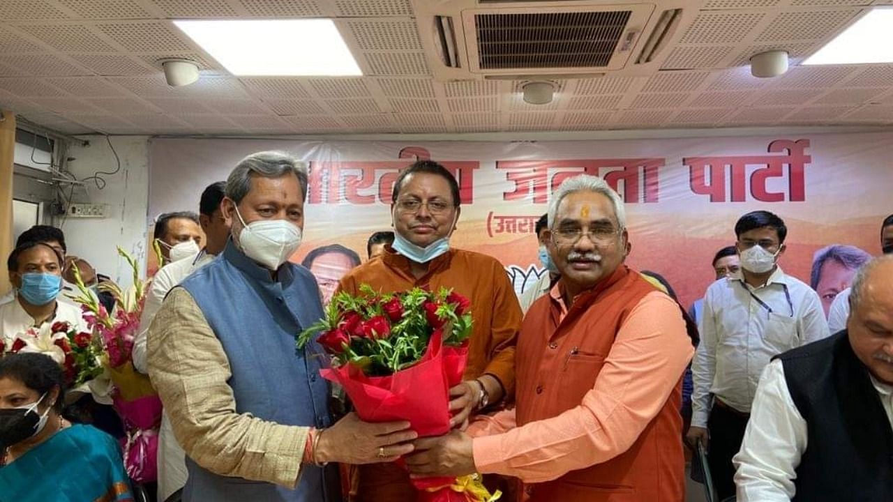 BJP leaders with Pushkar Singh Dhami following his appointment as Uttarakhand CM. Credit: Twitter/@BJP4UK