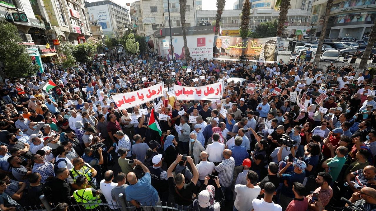 Palestinian demonstrators attend an anti-Palestinian Authority protest in Ramallah in the Israeli-occupied West Bank. Credit: Reuters Photo