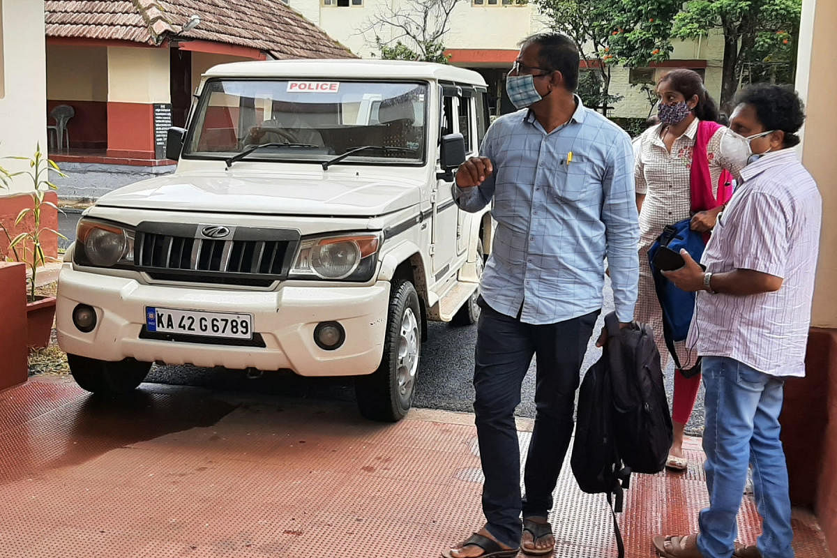 A team from the State Human Rights Commission arrives at the Inspection Bungalow in Virajpet, for an inquiry into the death of Roy D’Souza.