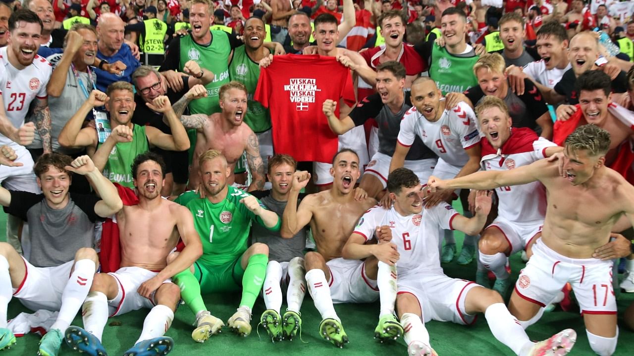 Denmark players celebrate after the match. Credit: Reuters Photo