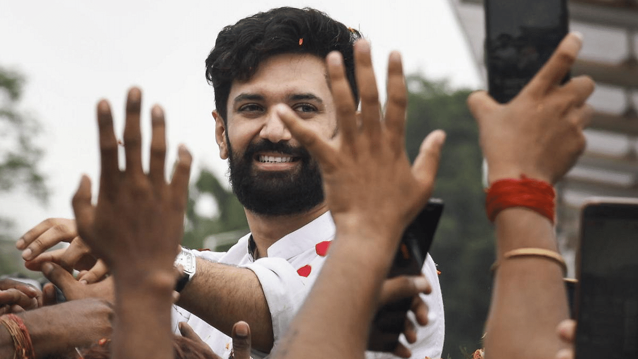 Lok Janshakti Party (LJP) leader Chirag Paswan being welcomed by his supporters at Jai Prakash Narayan airport during his 'Ashirvad Yatra' on the birth anniversary of late party's founder Ram Vilas Paswan, in Patna. Credit: PTI Photo