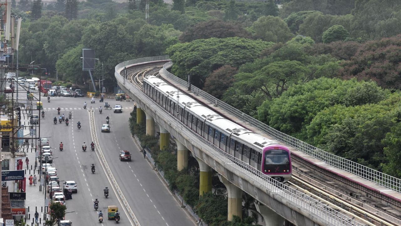 A metro train chugs into the MG Road station, Bengaluru. Credit: DH File Photo