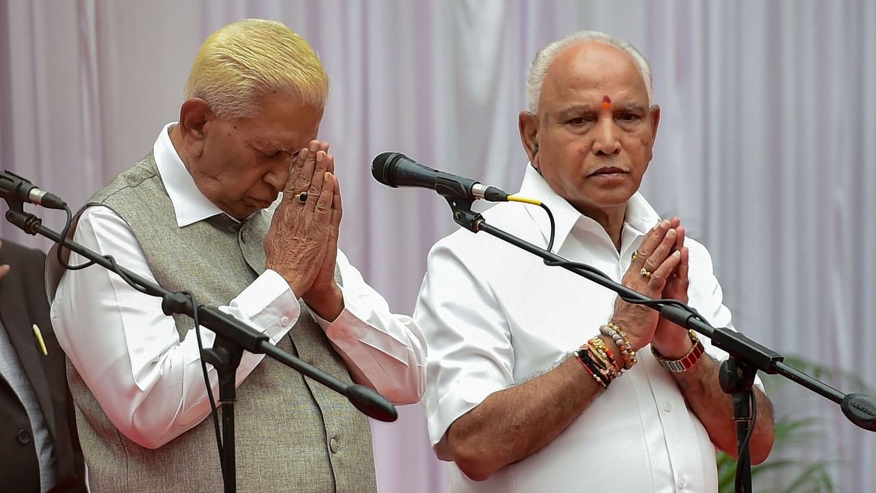 Karnataka Governor Vajubhai Vala and Chief Minister B S Yediyurappa. Credit: PTI File Photo