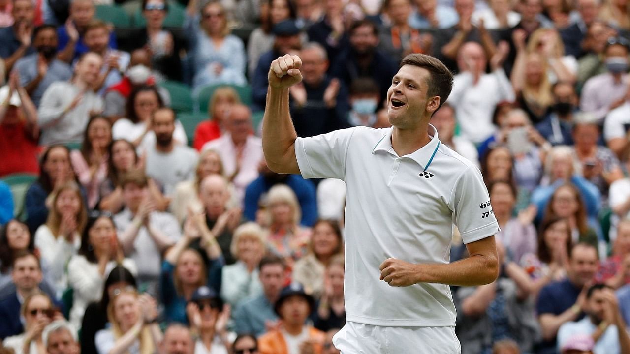 Hurkacz celebrates winning his fourth round match against Medvedev. Credit: Reuters Photo