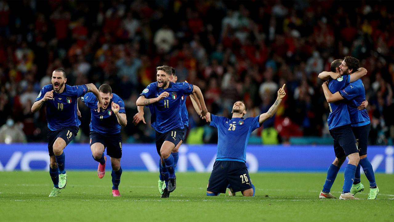  Italy players celebrate after winning the penalty shoot-out. Credit: Reuters Photo