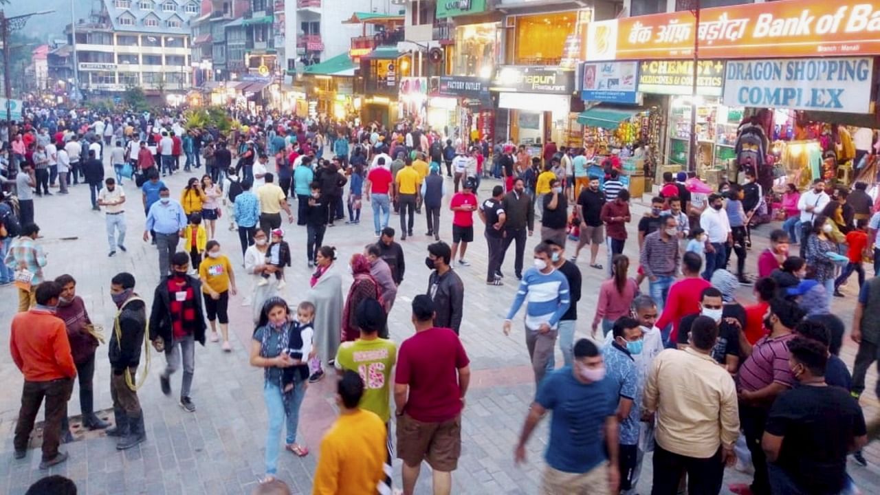Crowded Mall road after further ease in Covid-19 lockdown restrictions, in Manali, Saturday, June 26, 2021. Credit: PTI Photo