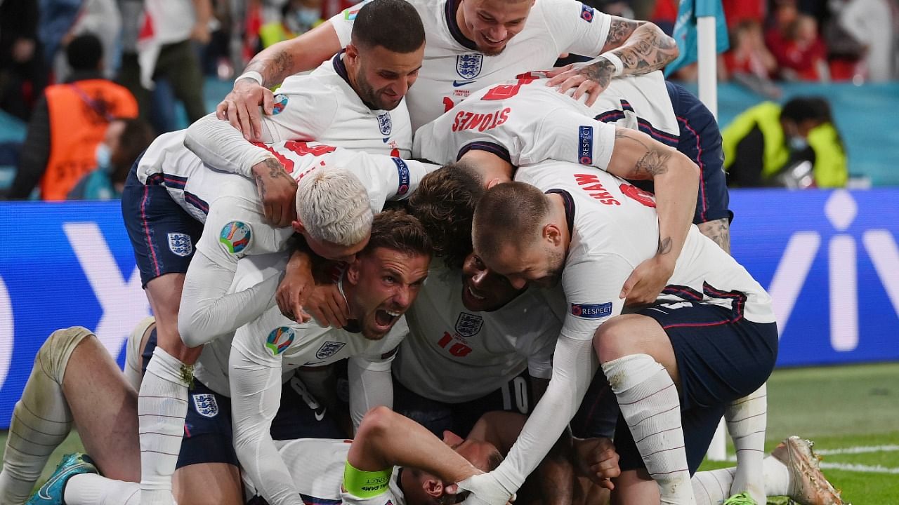 England players celebrate Harry Kane's winning goal against Denmark in the Euro 2020 semifinal. Credit: AP/PTI Photo