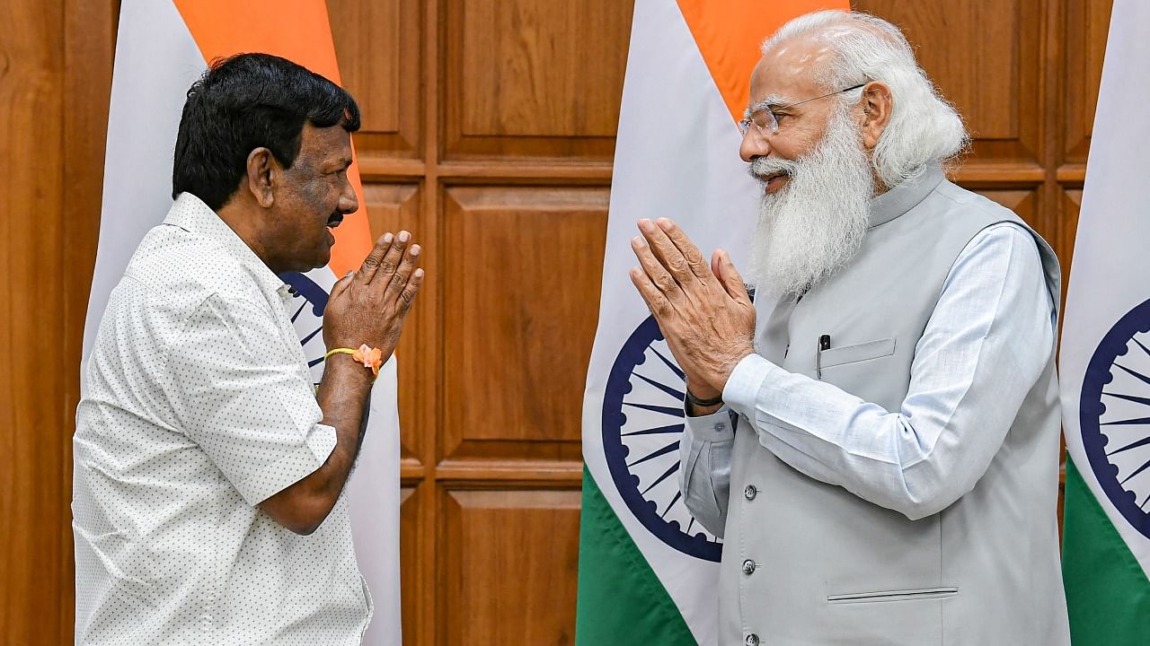 MP A Narayanaswamy with Prime Minister Narendra Modi before taking oath at 7, Lok Kalyan Marg in New Delhi. Credit: PTI Photo