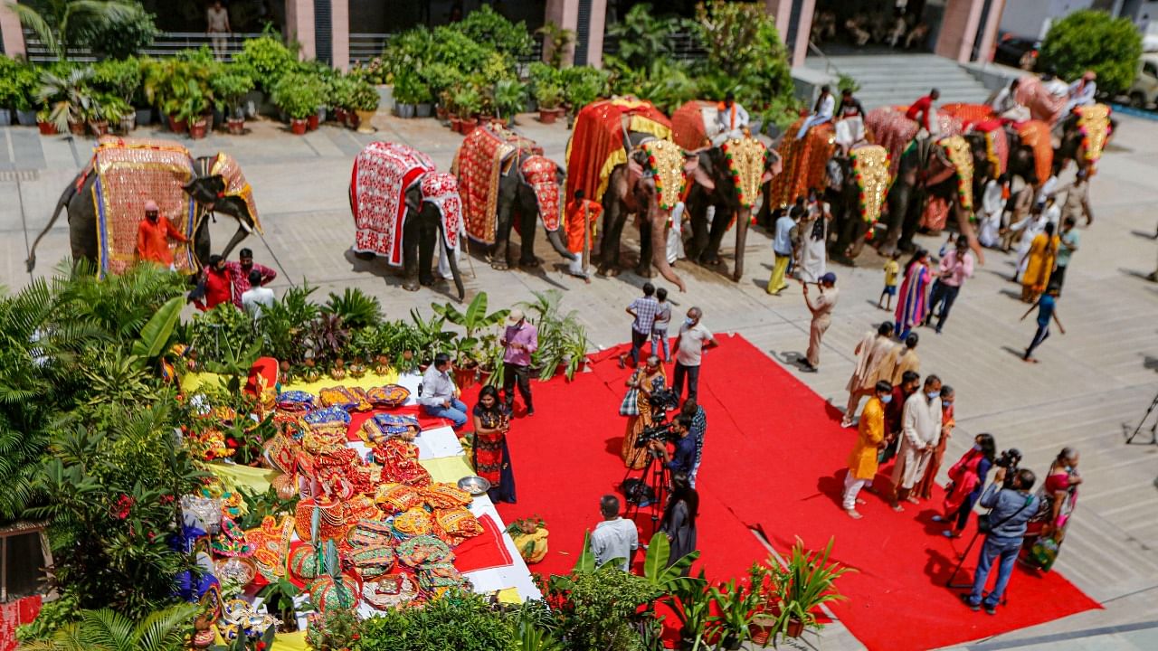 Devotees look at Lord Jagannath 'Mameru' ahead of annual Rath Yatra in Ahmedabad. Credit: PTI Photo