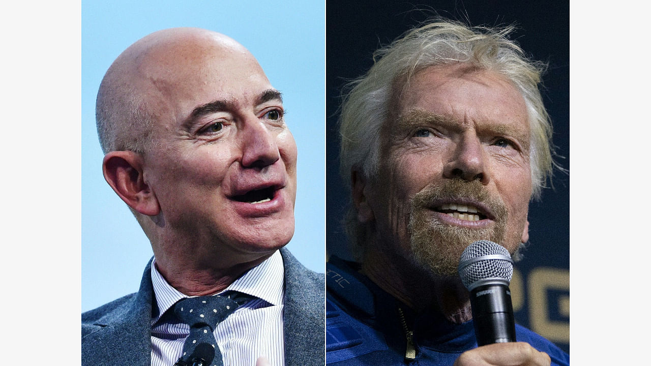 Blue Origin CEO Jeff Bezos and Virgin Galactic chief Richard Branson. Credit: AFP Photo