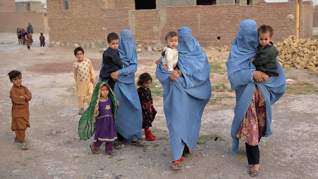Members of an internally displaced Afghan family. Credit: AFP Photo