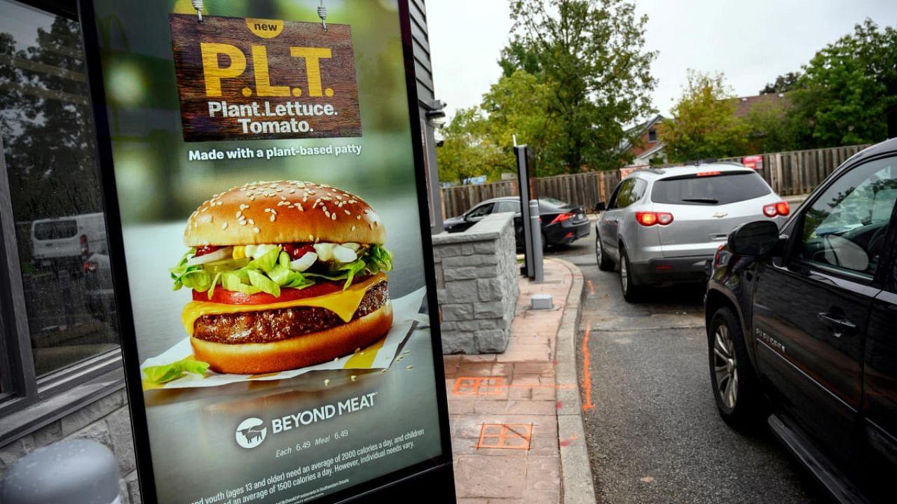 A sign promoting McDonald's "PLT" burger with a Beyond Meat plant-based patty at one of 28 test restaurant locations in London, Ontario, Canada. Credit: Reuters Photo