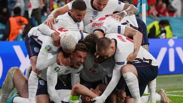 England players celebrate Harry Kane's winning goal against Denmark in the Euro 2020 semifinal. Credit: AP/PTI File Photo