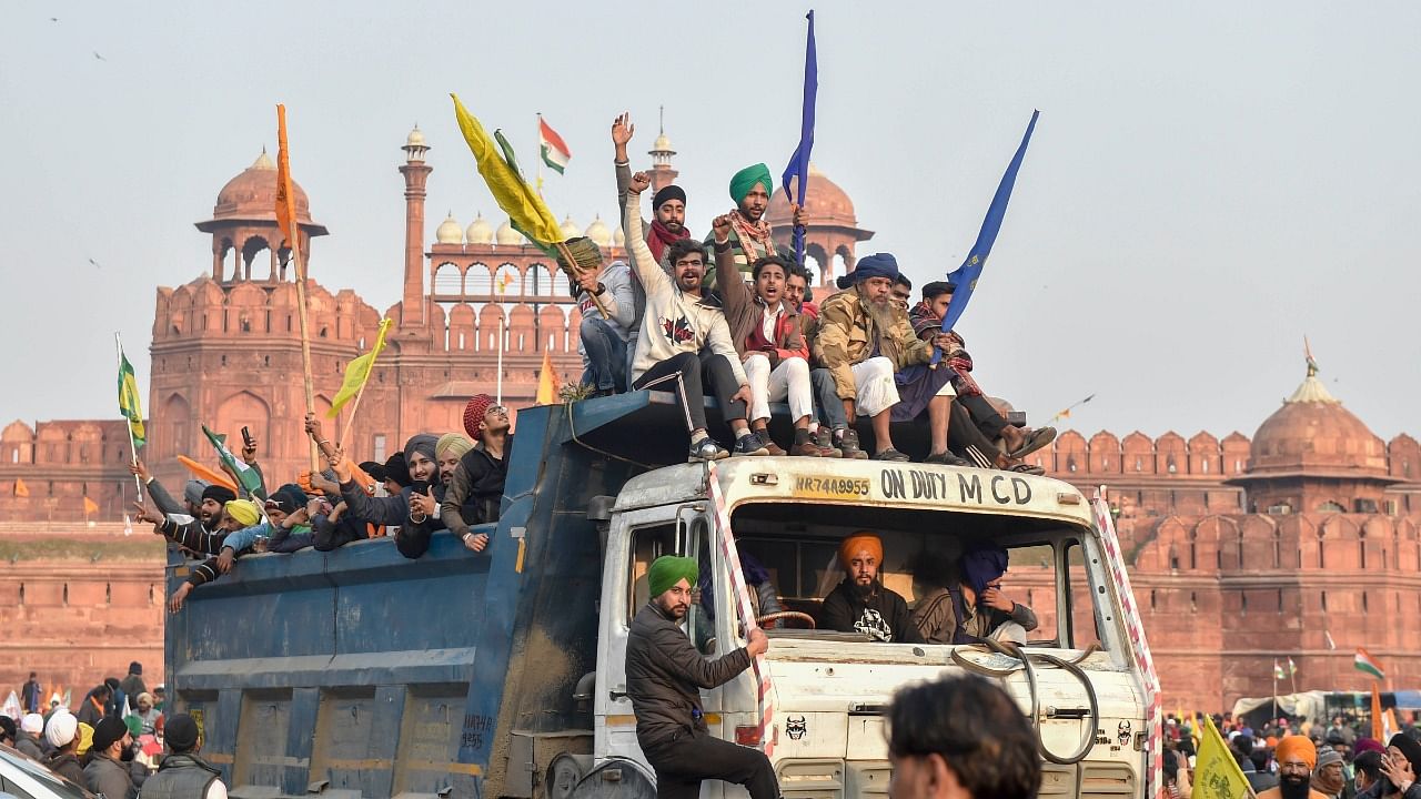 Farmers arrive at Red Fort during their tractor parade on Republic Day, in New Delhi. Credit: PTI File Photo