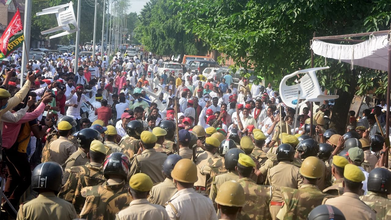 Police personnel lathi-charge on Samajwadi Party workers as they protest against declaring BJP candidate DR.VK Singh win in District Panchayat President election, in Prayagraj. Credit: PTI file photo