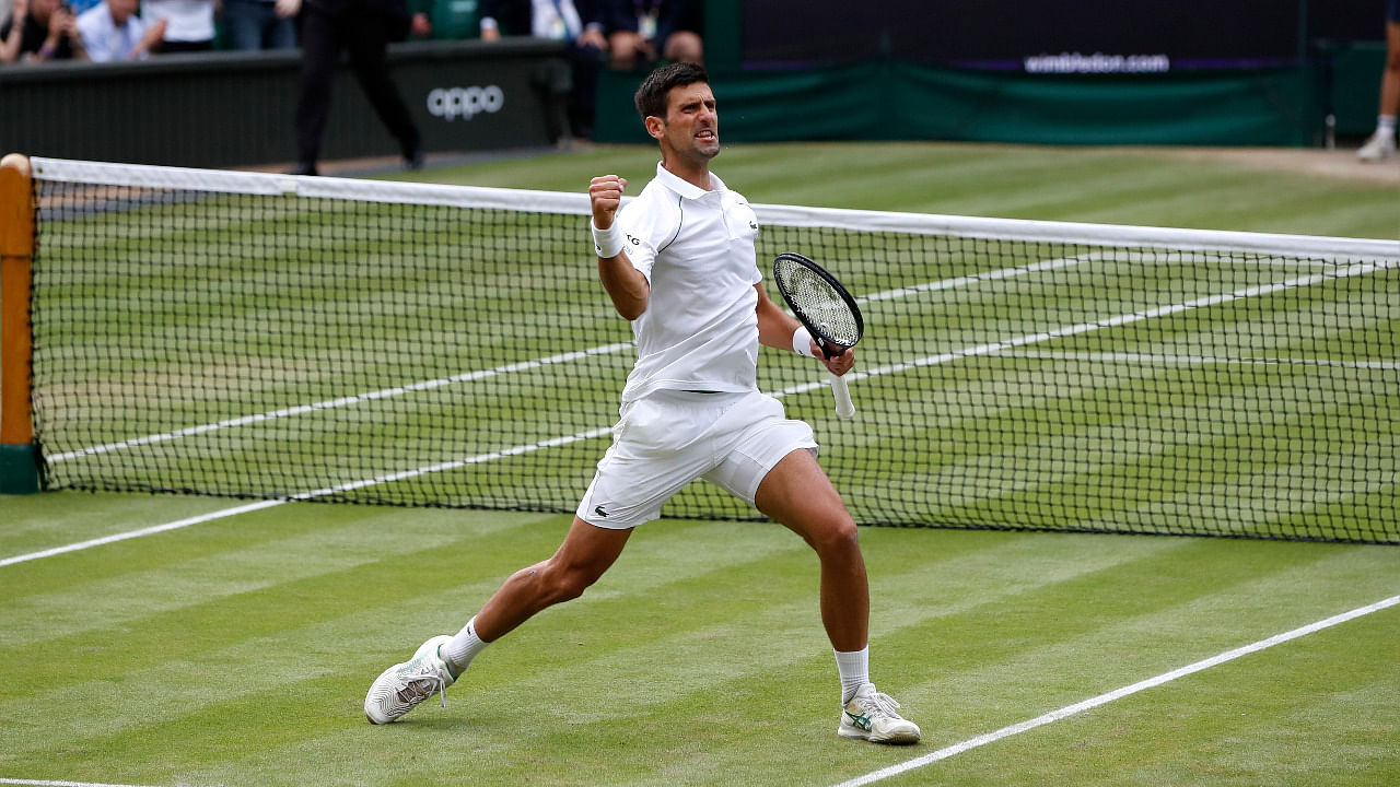 Serbia's Novak Djokovic celebrates winning his semi final match against Canada's Denis Shapovalov. Credit: Reuters Photo