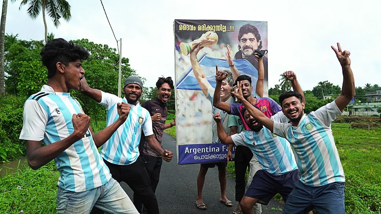 Fans of Argentina celebrate in Kerala. Credit: AFP Photo